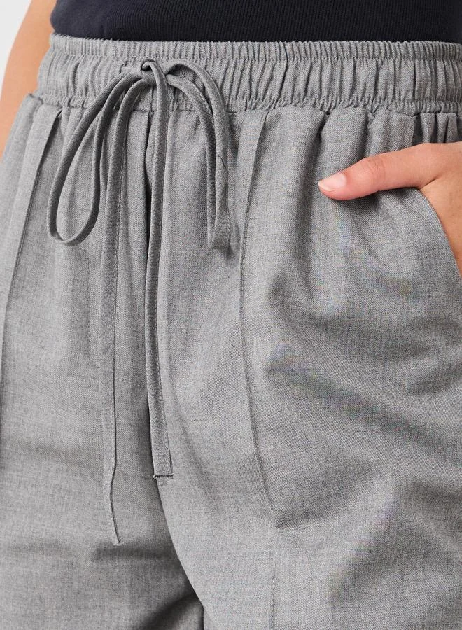 Styli Styli Solid Pintuck Detail Tapered Fit Pants with Elasticated Waistband