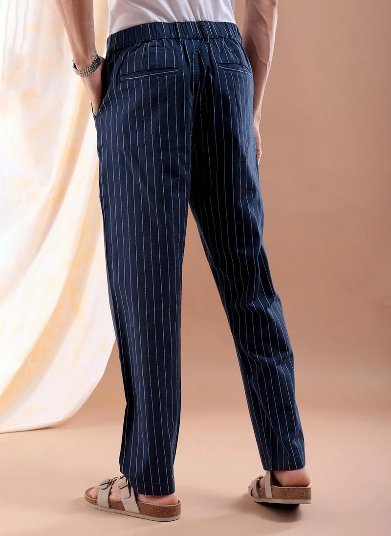 ذا انديان كراج كو Men Relaxed Cropped Vertical Striped Mid-Rise Trousers