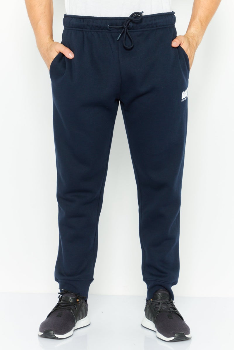 DKNY Sport Men Sportswear Fit Drawstring Training Jogger Pants, Navy - Image 1