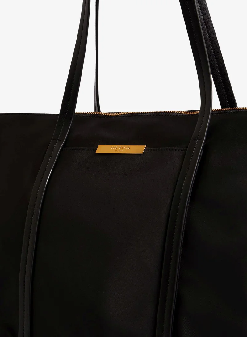 تيد بيكر نيكول توت كبيرة