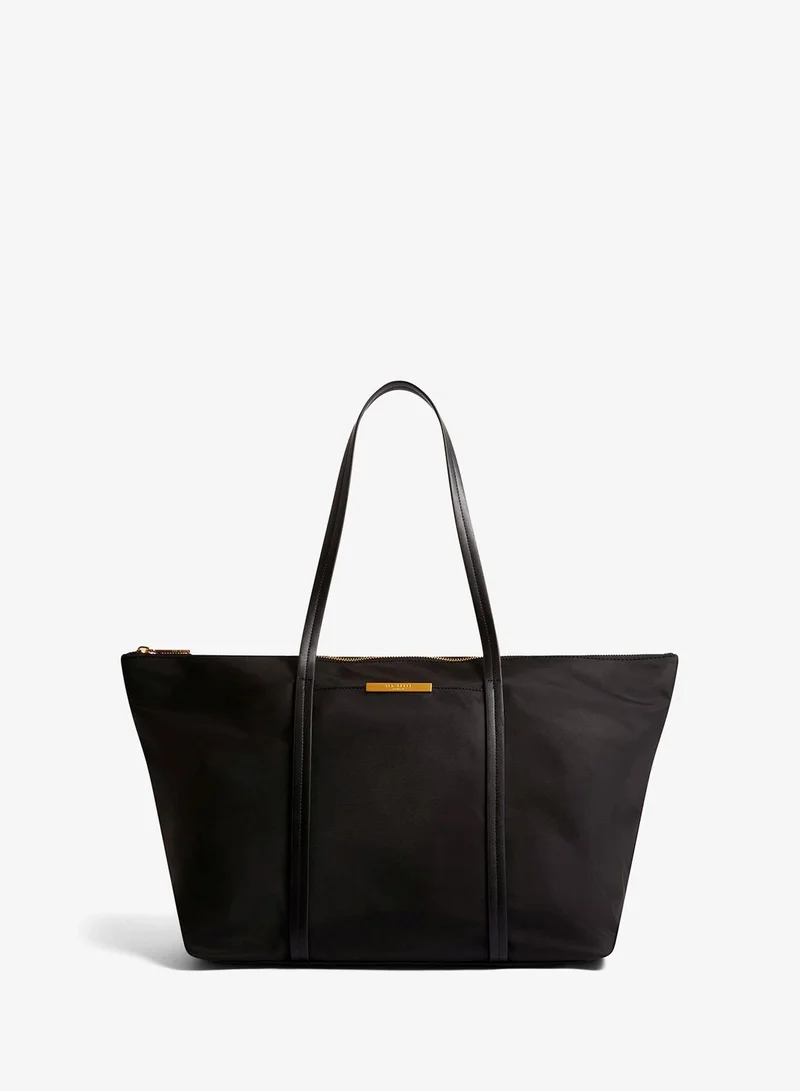 تيد بيكر نيكول توت كبيرة