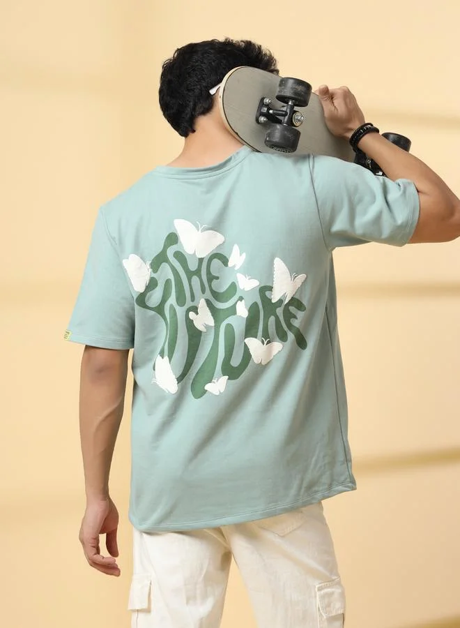 تايك تو تيشيرت بقصة واسعة بطبعة جرافيك خلفية