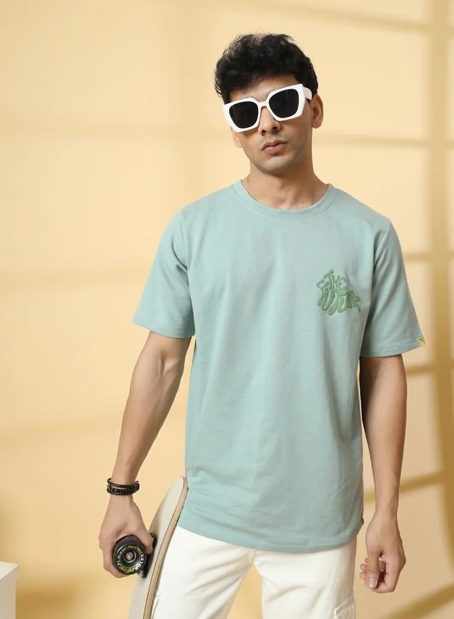 تايك تو تيشيرت بقصة واسعة بطبعة جرافيك خلفية