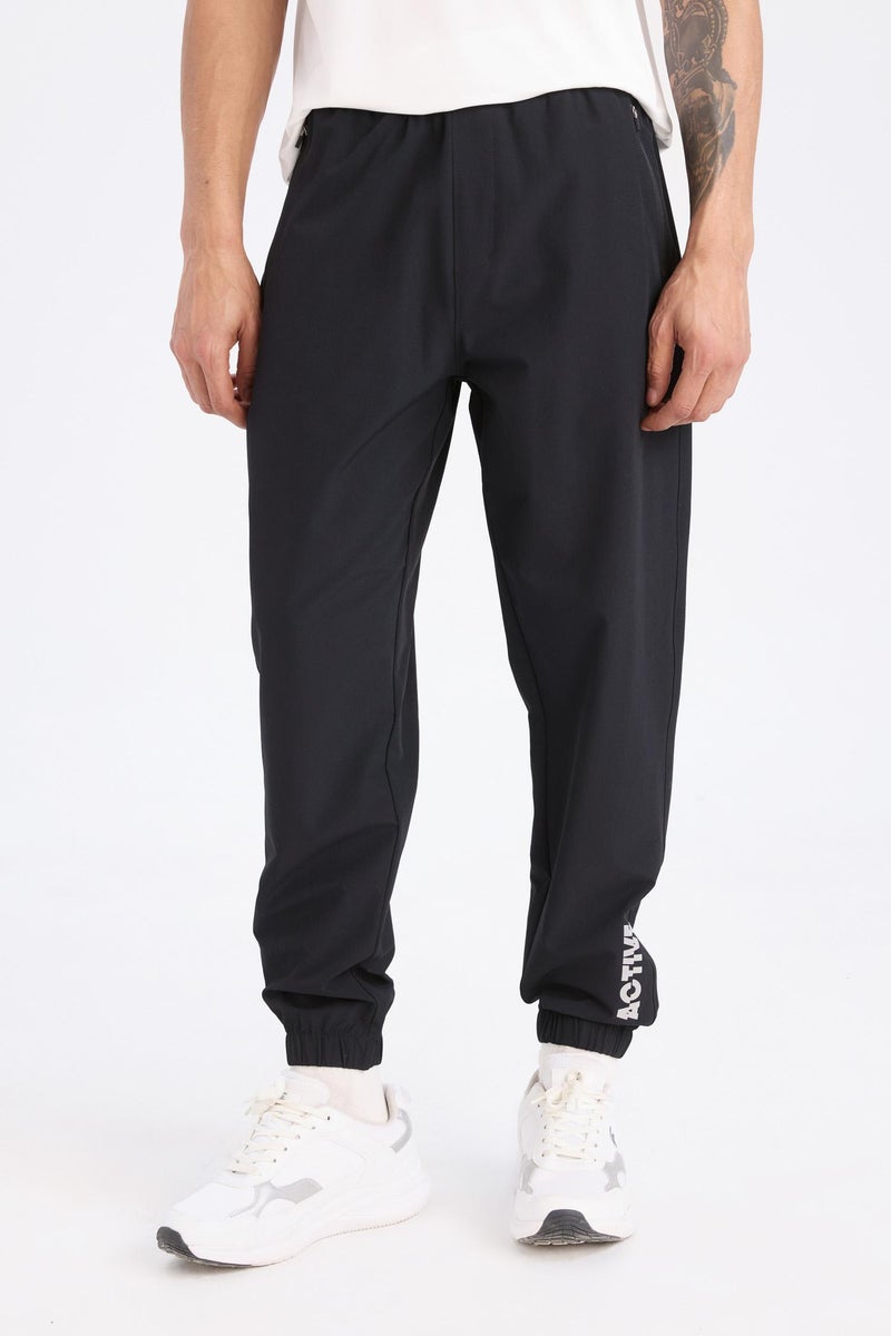 DeFacto Black Man DeFactoFit Slim Fit Double Pocket Woven Sports Joggers Casual - Image 4