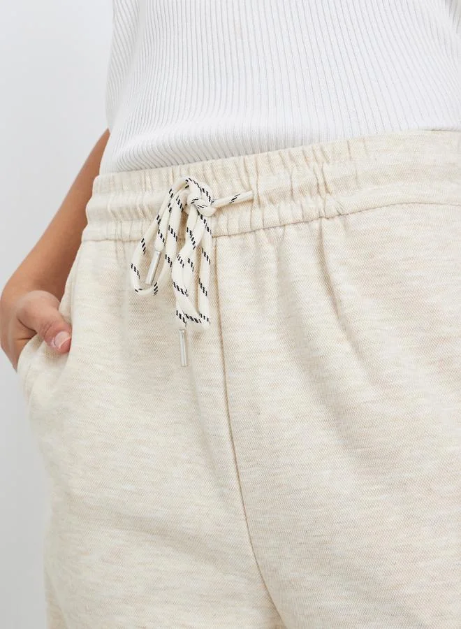Styli Cream Solid Cuffed Joggers
