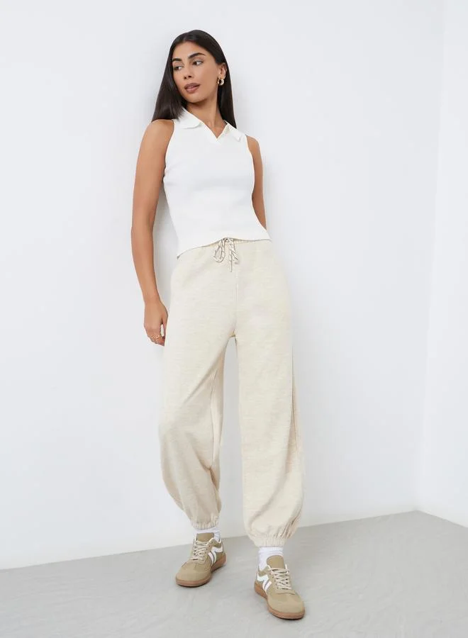 Styli Cream Solid Cuffed Joggers