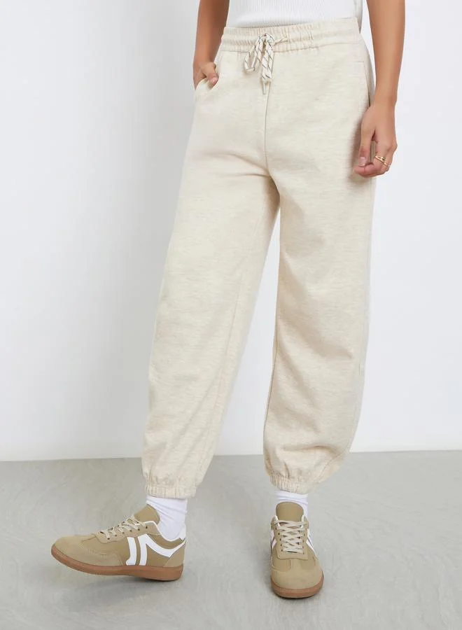 Styli Cream Solid Cuffed Joggers