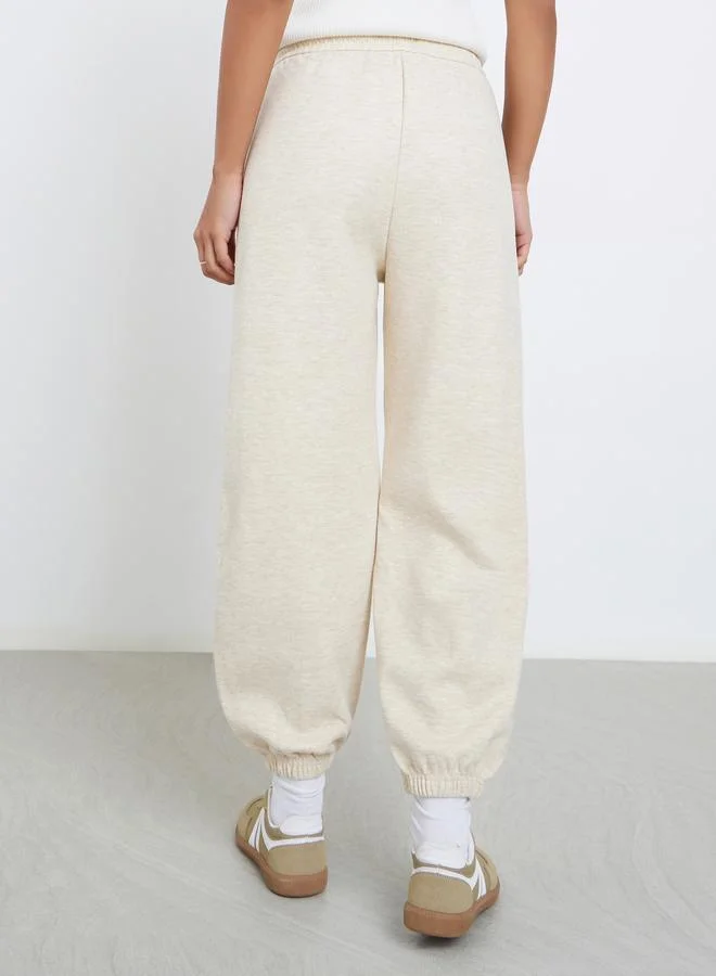 Styli Cream Solid Cuffed Joggers