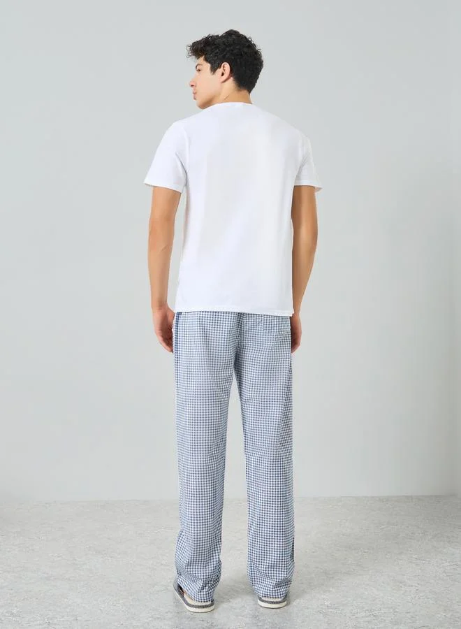 Styli  Men Solid Relaxed T-Shirt and Checked Pyjama Set for Men | Best Price UAE