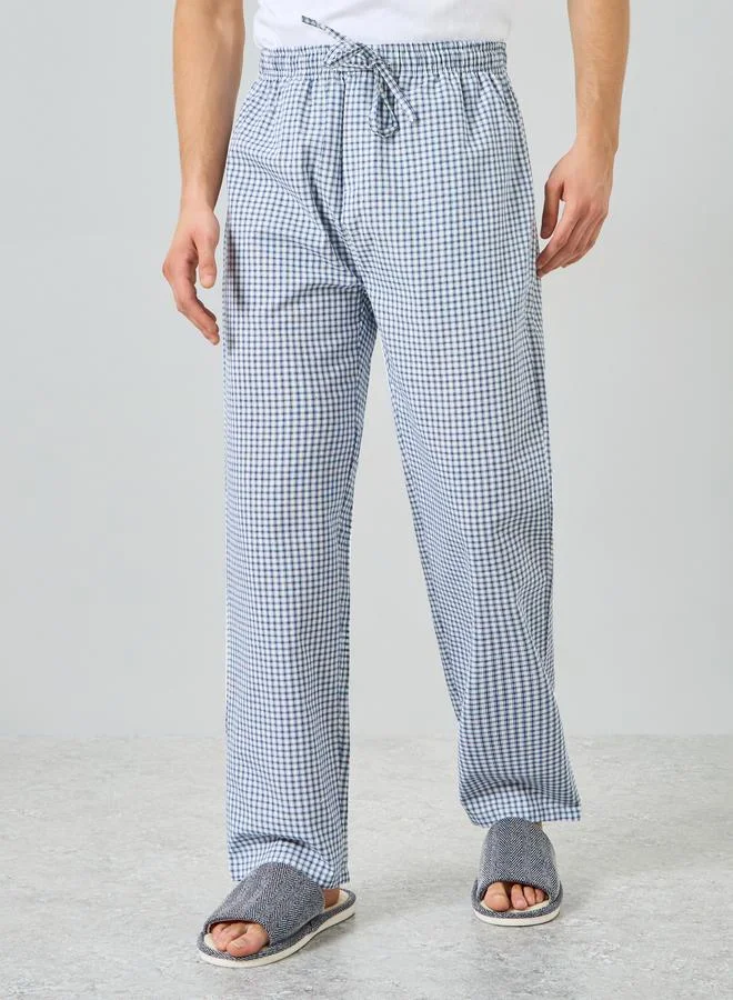 Styli  Men Solid Relaxed T-Shirt and Checked Pyjama Set for Men | Best Price UAE