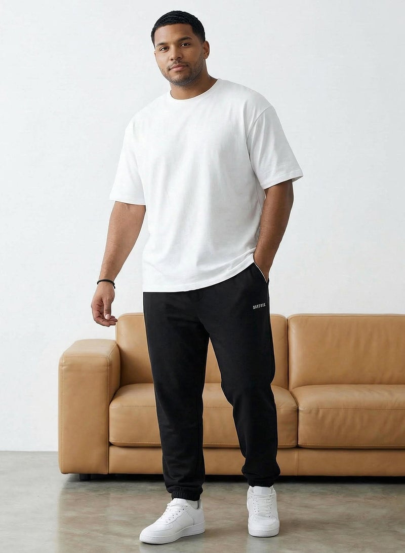 trendyol Black Large Size Regular Fit Printed Piped Rubber Leg Sweatpants Tmnss26Aj00001 - Image 1