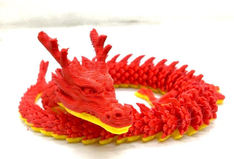 CERO ® 3D Printed Single Flexi Chinese Dragon/Home Decor/Display (Yellow and Red PLA Plastic) - Image 1