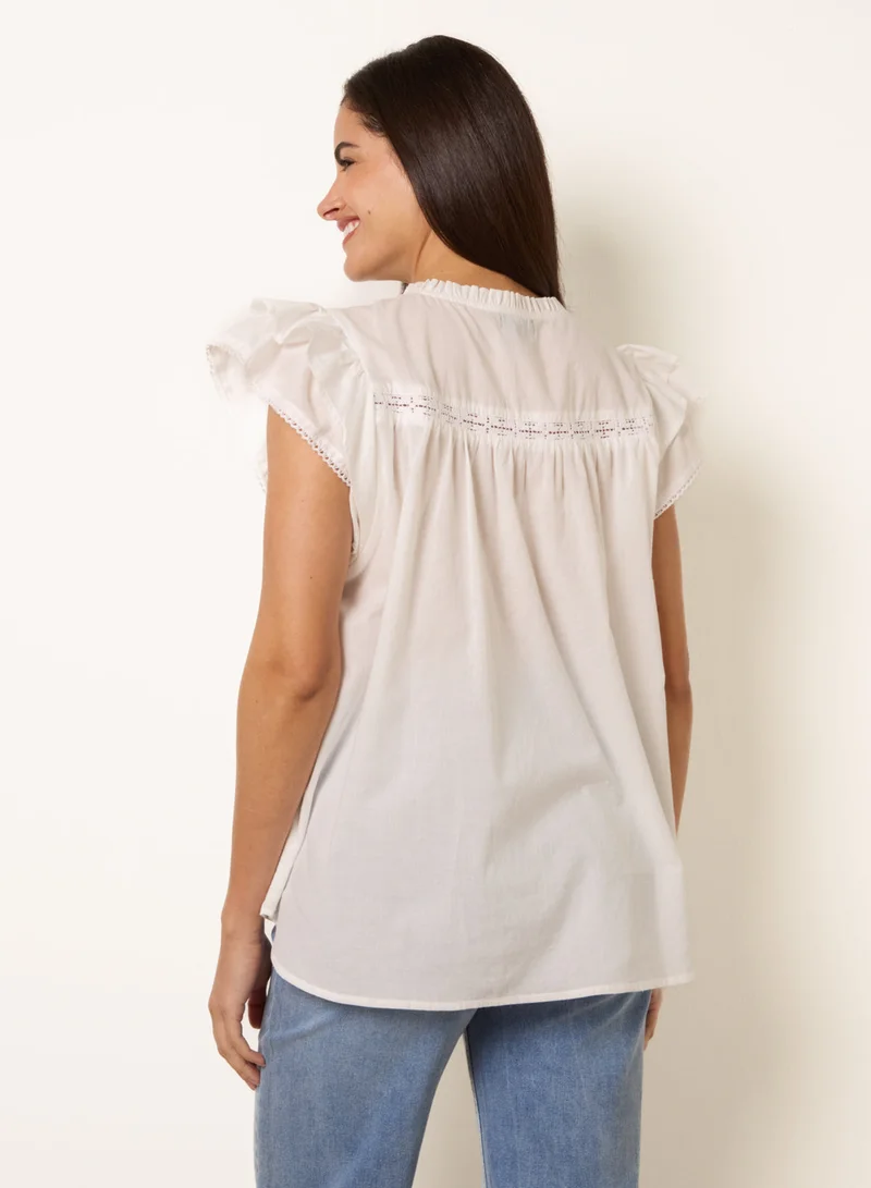 بلو فانيلا Cotton Embroidery Detail Ruffle Sleeve Top