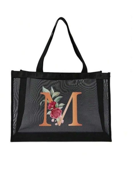 Modern beach bag | Spacious design with a distinctive top snap | Durable water-resistant material | Perfect for beach trips and poolsides M