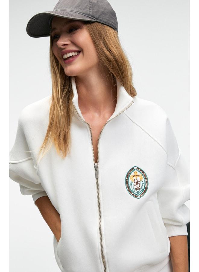 GRIMELANGE TORMENTA Women's Embroidered Zipper Straight Collar Double Pocket Raglan Sleeve White Sweatshirt. - Image 2