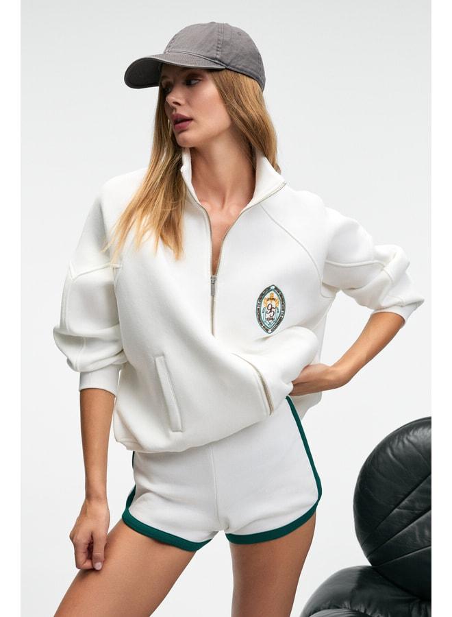 GRIMELANGE TORMENTA Women's Embroidered Zipper Straight Collar Double Pocket Raglan Sleeve White Sweatshirt. - Image 1