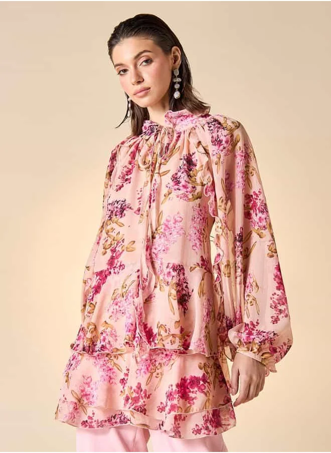 ايكونيك Iconic Floral Print Ruffle Detail Top with Tie-Up Neck and Long Sleeves