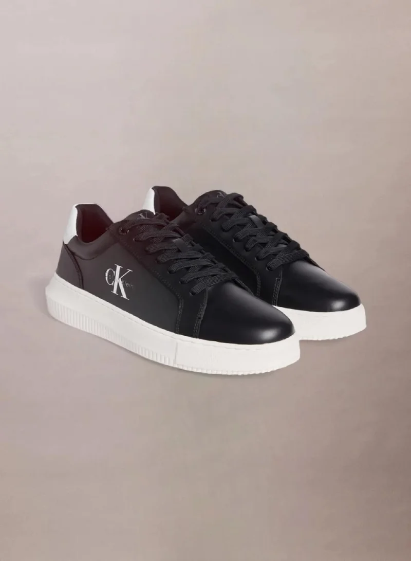 Calvin Klein Black/Bright White Leather Trainers for Men | Best Price UAE