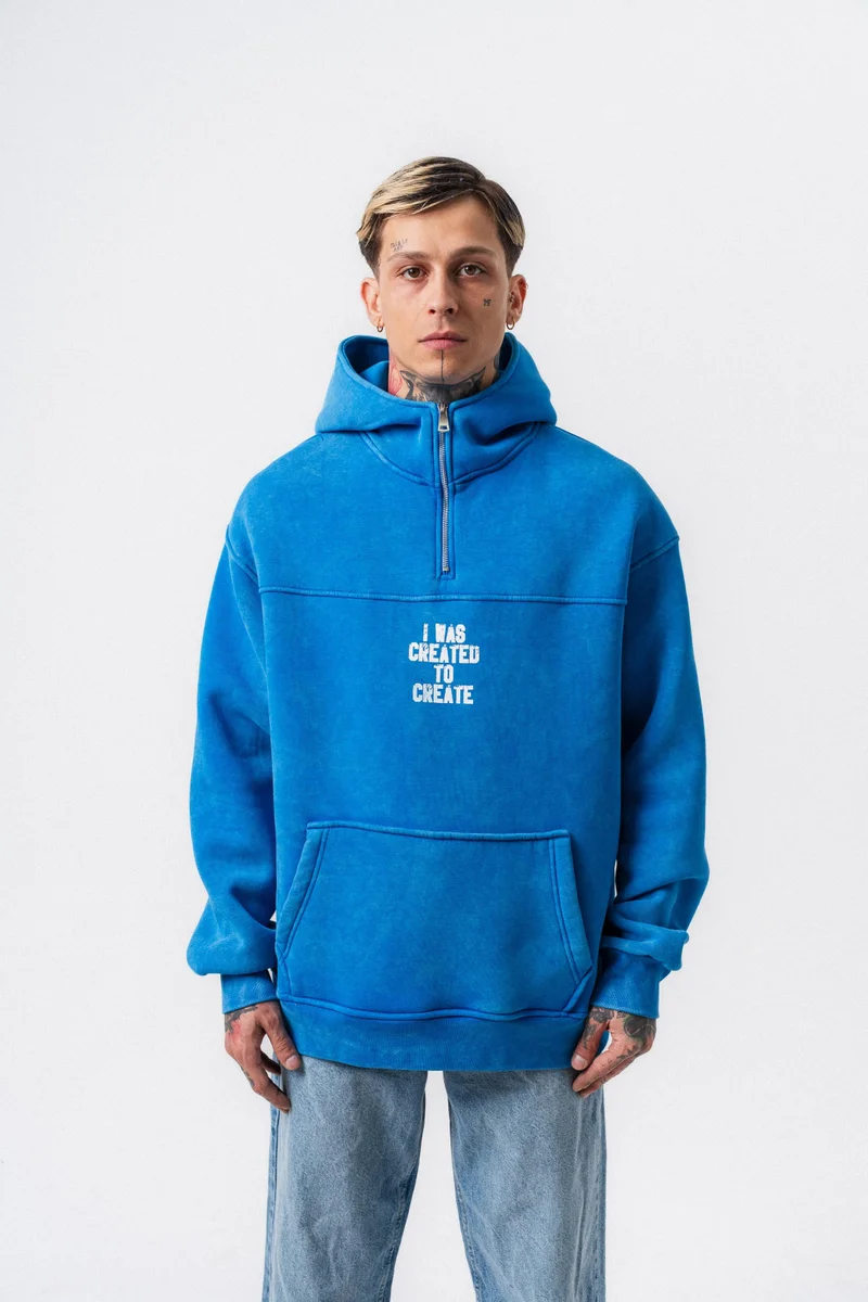 ريسباير هودي رجالي واسع (Oversize) بغطاء رأس مطبوع بعبارة "Create" لون أزرق