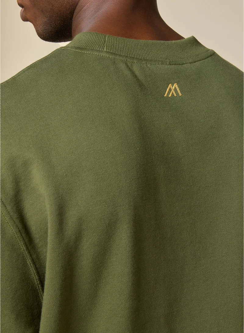 MANNERISM  The Olive Essential Cotton Sweatshirt with Crew Neck Relaxed Fit for Men | Best Price UAE