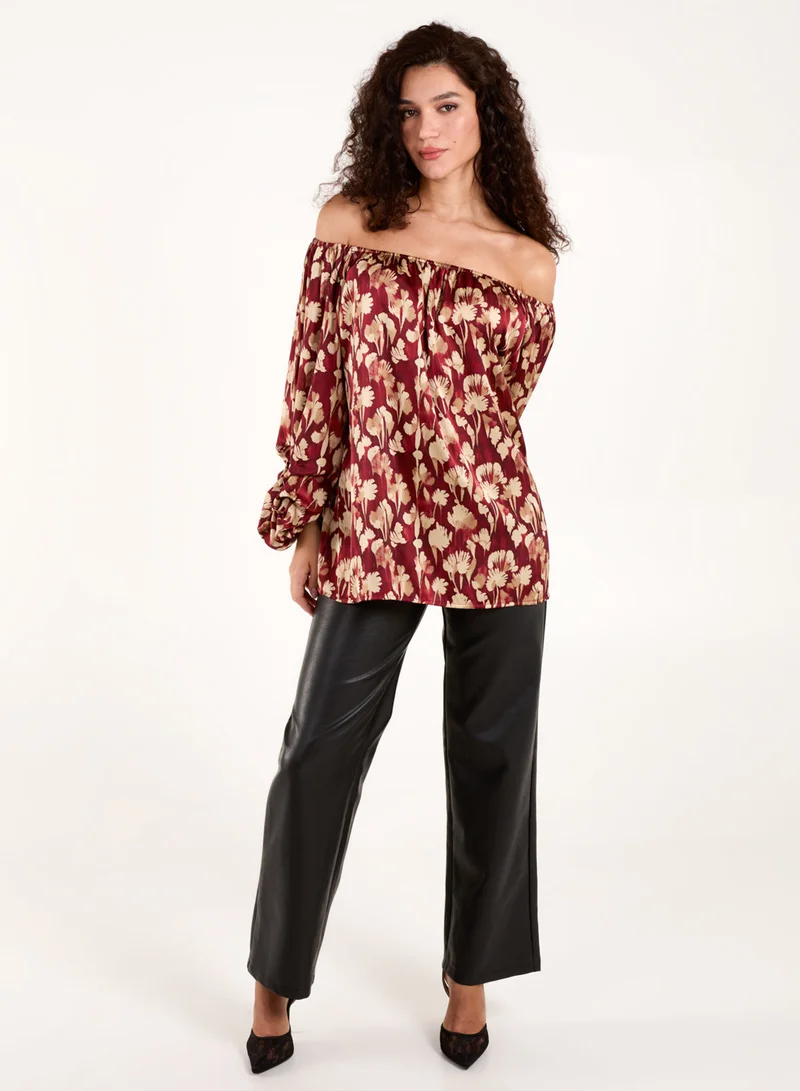 بلو فانيلا بلوزة بكتف مكشوف وأكمام مكشكشة بنقشة الزهور