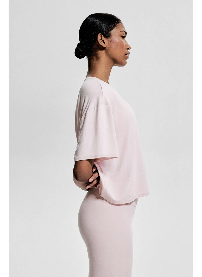 H&M Boxy-style sports top in DryMove™