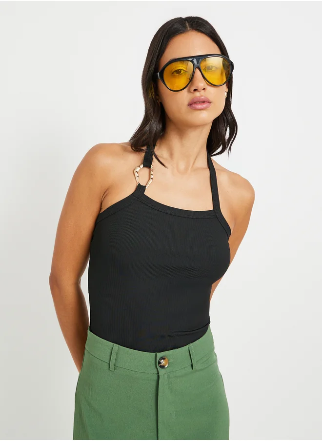 ستايلي Solid Halter Neck Top with Buckle Detail