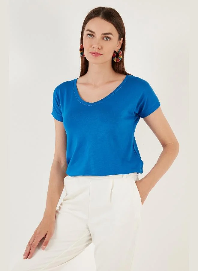 ليلا بلوزة نسائية بياقة على شكل حرف ، قصة مريحة، تفاصيل فتحات جانبية، عبوة من قطعتين