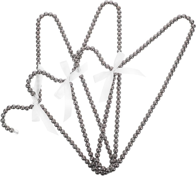 UV resistant Outanaya 3pcs Black Plastic Faux Pearl Bow Clothes Hangers for Adults, Bridal Dress and Sweaters Storage, Costume and Coat Hangers for Clothing Stores and Home Use Transparent body Periodic restock local Gulf popular simple design Daily life matching design Daily use improved quality Ready-to-ship local stock Multi-use detailed build KSA market popular practical build Yearly optimized delivery route Anti slip Precision made Growing order stock support Storage transit efficiency build Simple multi-feature universal build Universal design Safe material Month-round consistent deliver Pre-stock well-packed goods In-Kingdom stored commodity Authorized haulage delivery Home & professional compatible Individual & group usable Season change compatible build Local supply chain stock - Image 1