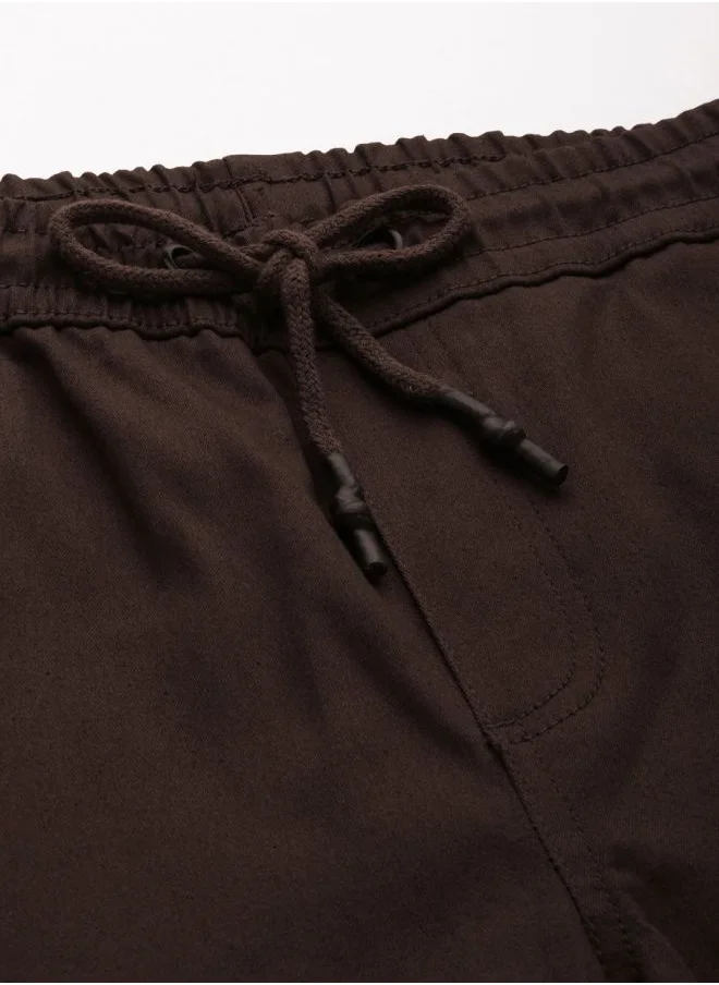 شركة المرآب الهندية Men Slim Fit Solid Mid-Rise Stretchable Chino Joggers