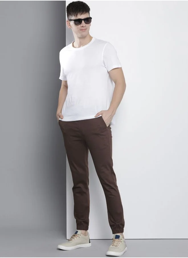 شركة المرآب الهندية Men Slim Fit Solid Mid-Rise Stretchable Chino Joggers