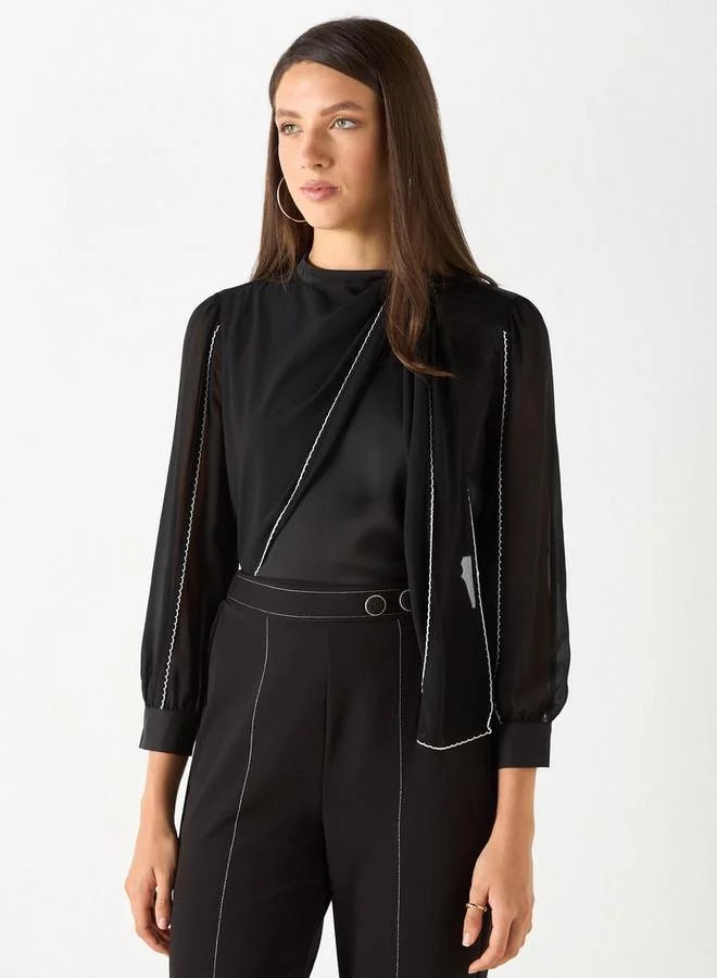 ايكونيك بلوزة سادة بأكمام طويلة وتفاصيل متداخلة من آيكونيك