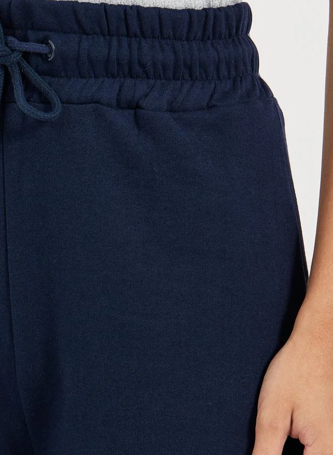 Styli Solid Drawstring Waist Flared Joggers