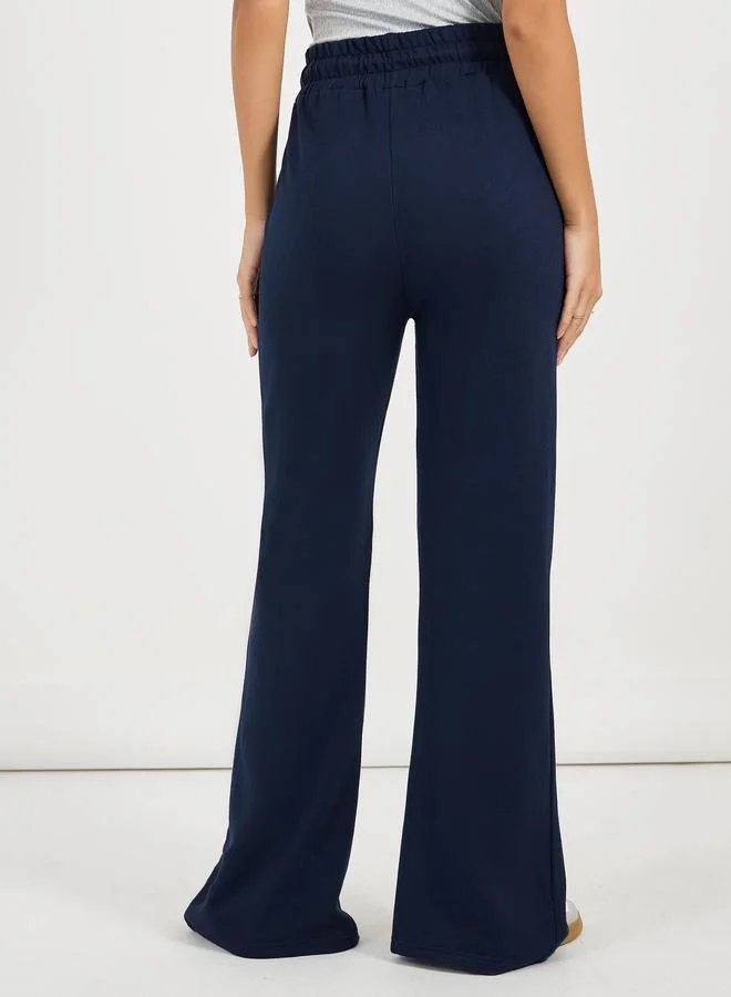 Styli Solid Drawstring Waist Flared Joggers