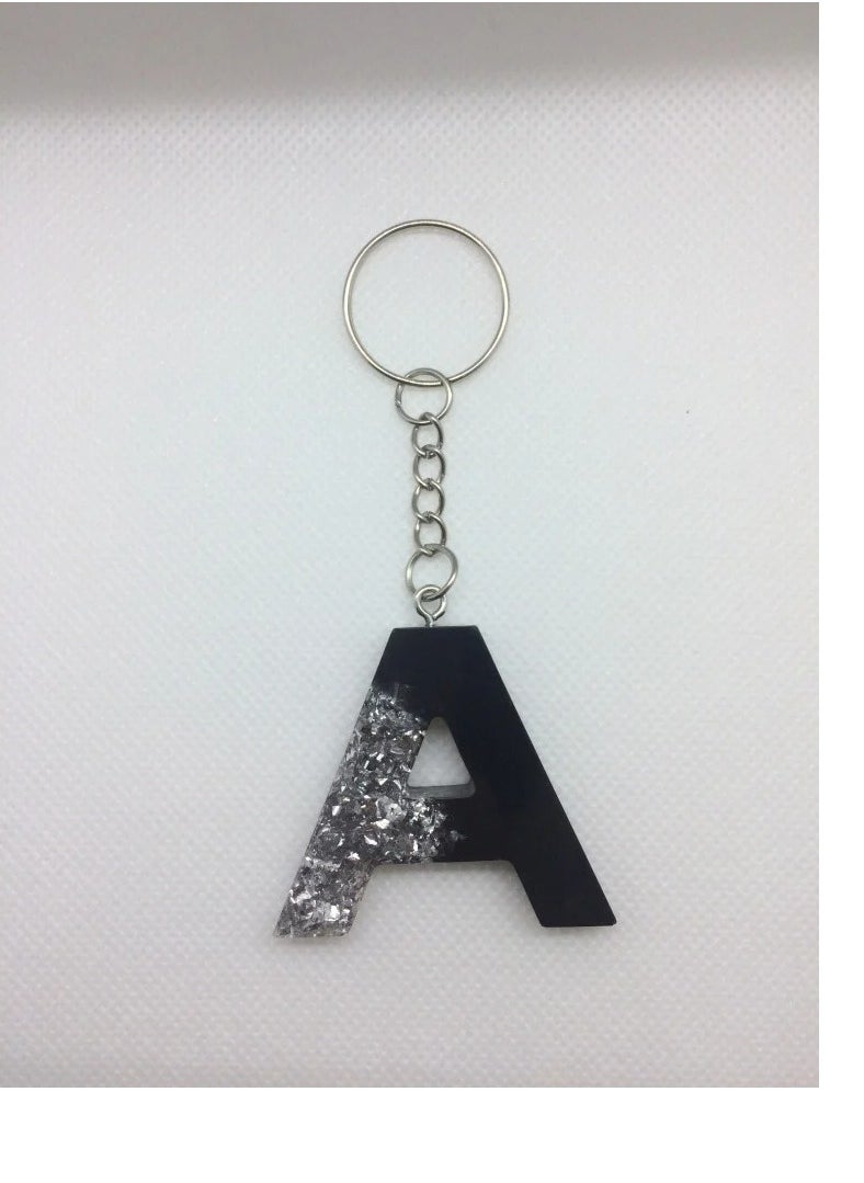 Generic - An English A-shaped keychain made of epoxy resin in multiple, distinctive and attractive colors that can be presented as a gift. - Image 1