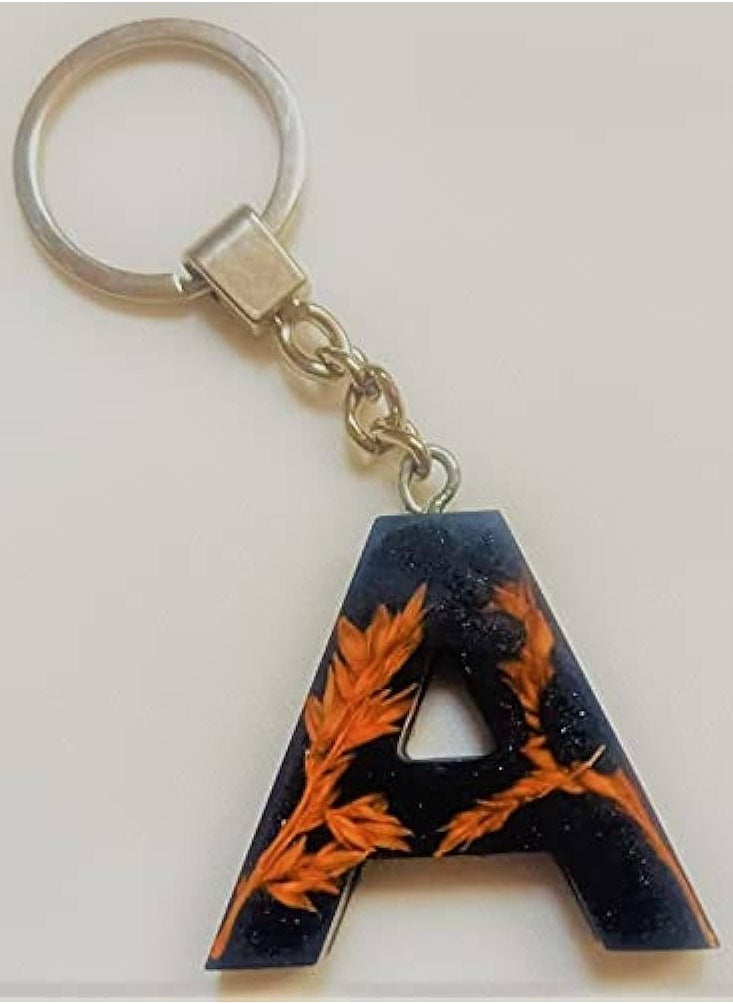 Generic - An English A-shaped keychain made of epoxy resin in multiple, distinctive and attractive colors that can be presented as a gift. - Image 1