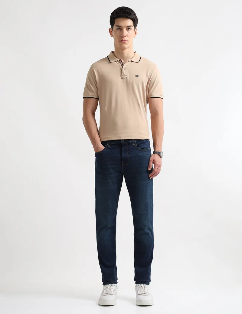 Arrow Blue Soho Slim Tapered Fit Whiskered Jeans for Men | Best Price UAE