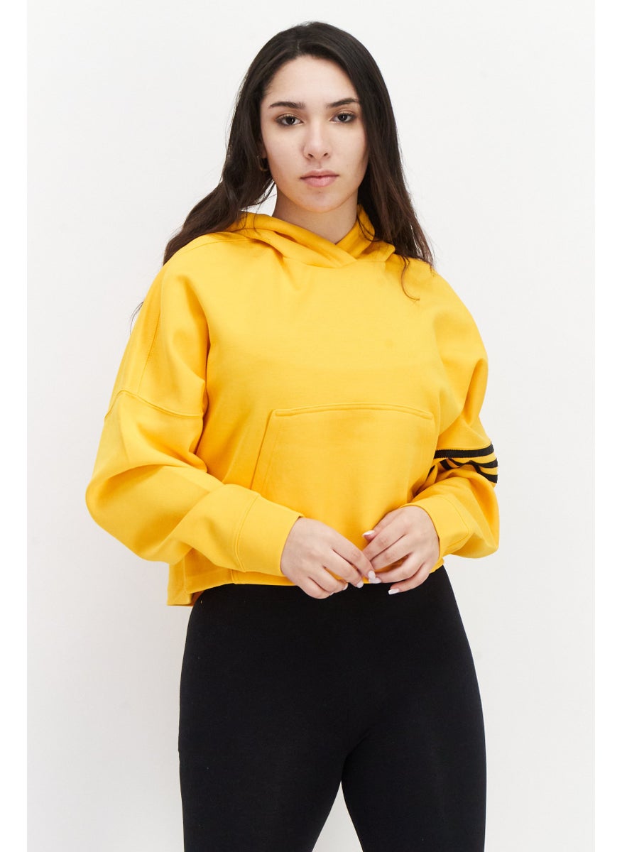 adidas Originals Women Sportswear Fit Embroidered Logo Outdoor Hoodie, Yellow  - Image 1