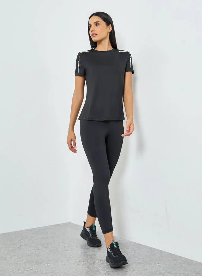 Styli Active Black Shoulder Reflective Stripe and Text Detail Short Sleeves Top