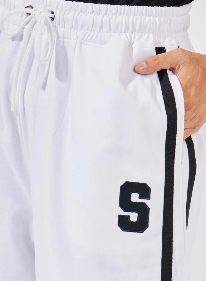 Styli Premium Side Tape Wide Leg Joggers with Embroidery Badge