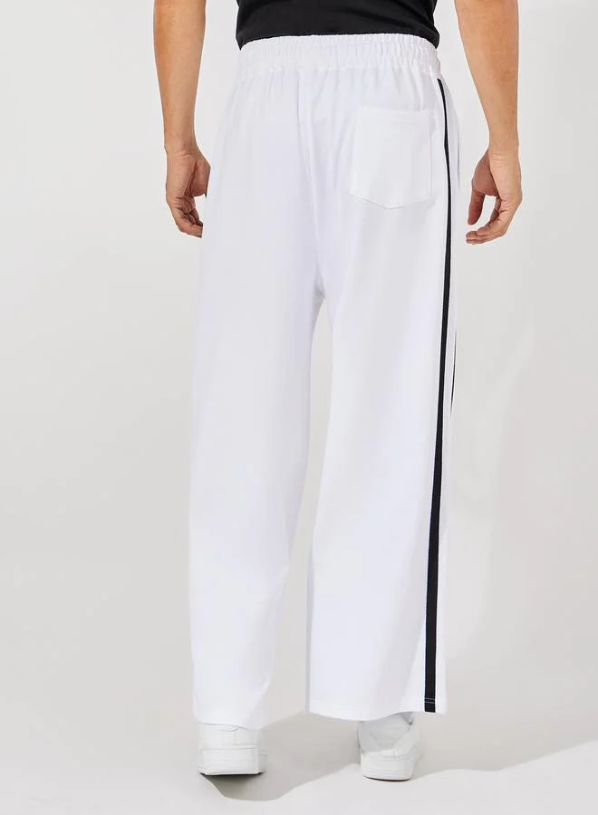 Styli Premium Side Tape Wide Leg Joggers with Embroidery Badge