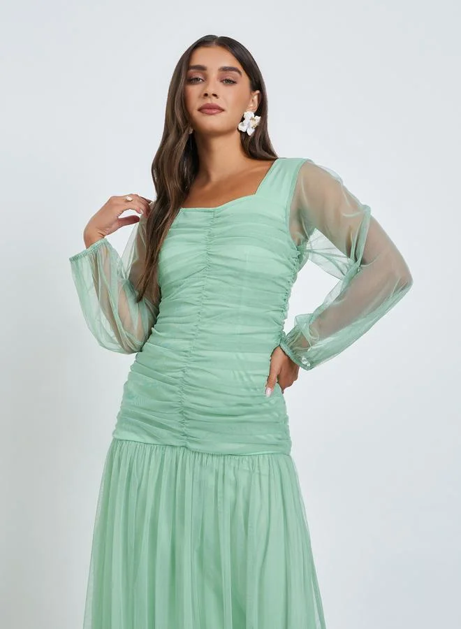 ستايلي فستان طويل بأكمام طويلة وزمزمة