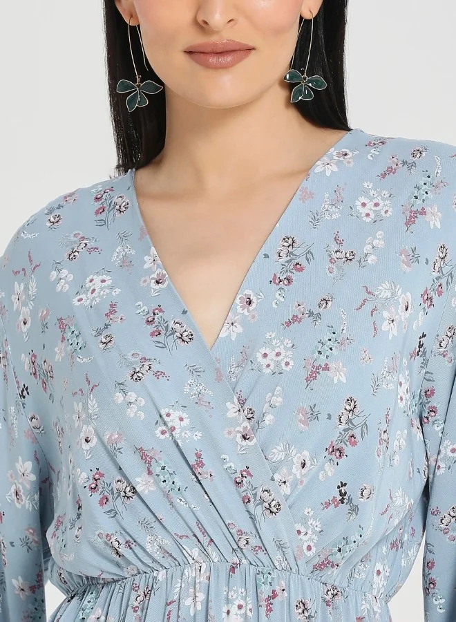 ZABAIONE Elegant Blue Floral Long Sleeve Mini Dress with Ruffled Hem