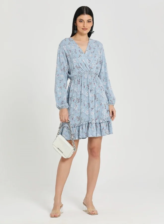 ZABAIONE Elegant Blue Floral Long Sleeve Mini Dress with Ruffled Hem