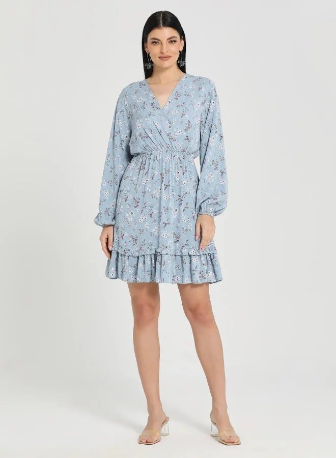 ZABAIONE Elegant Blue Floral Long Sleeve Mini Dress with Ruffled Hem