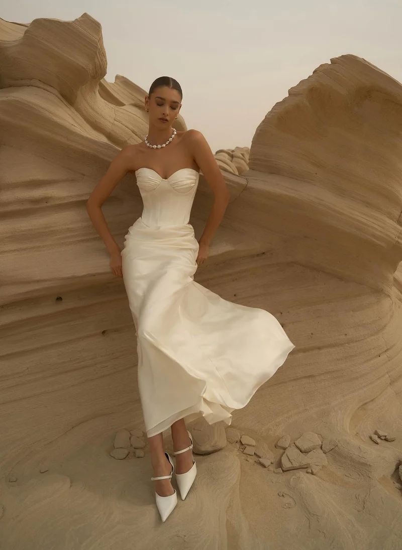 Lichi Satin maxi skirt with draping on the hips