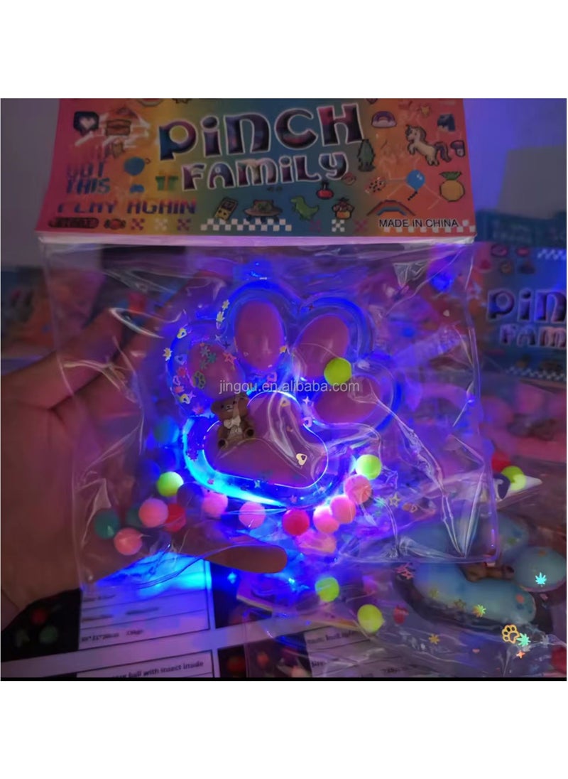 null - Light-up cat paw squishy, ​​featuring a cute, fun design and attractive colors. It has an internal light that lights up when squeezed, adding a fun and exciting element. - Image 1