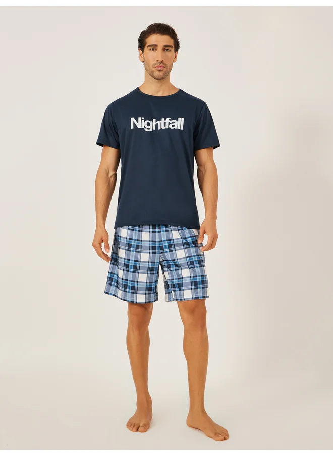 Styli Styli Unwind Slogan Printed T-Shirt and Checked Shorts Set