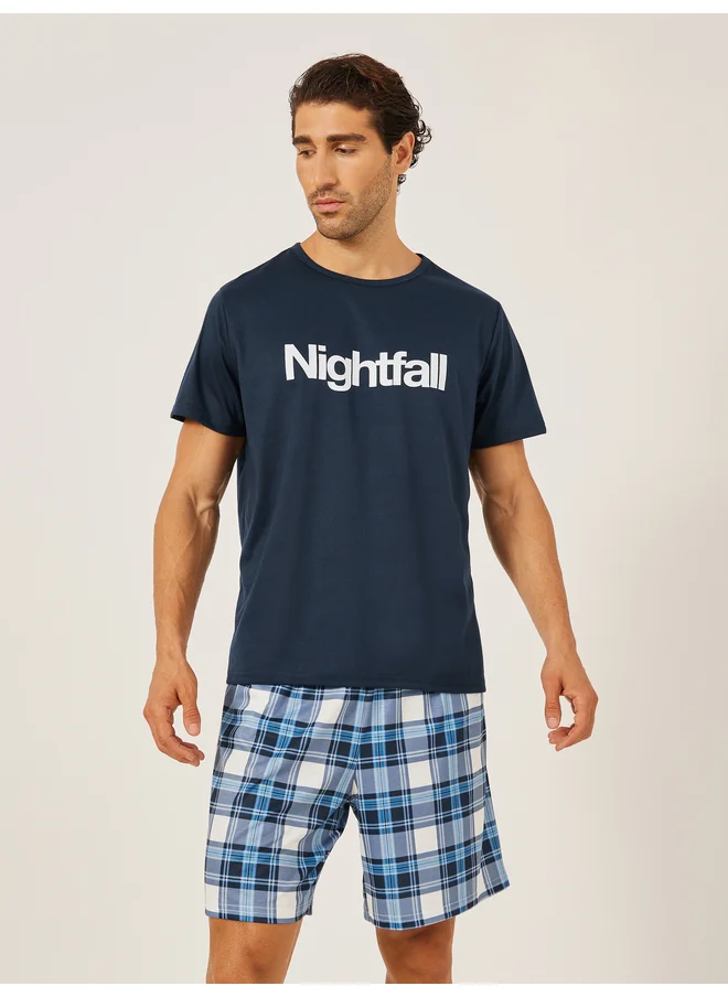 Styli Styli Unwind Slogan Printed T-Shirt and Checked Shorts Set