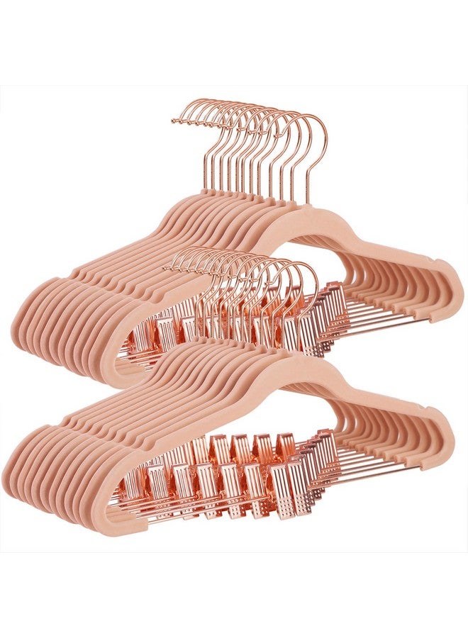 SONGMICS SONGMICS 24 Pack Pants Hangers, 16.7 Inch Coat Hangers with Rose Gold Colored Movable Clips, Heavy-Duty, Non-Slip, Space-Saving, for Pants, Skirts, Dresses, Light Pink UCRF14PK24 - Image 1